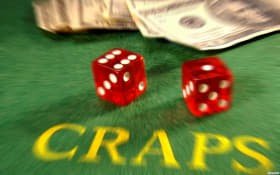 Game lobby showing live tables, sports betting menu, and slot categories